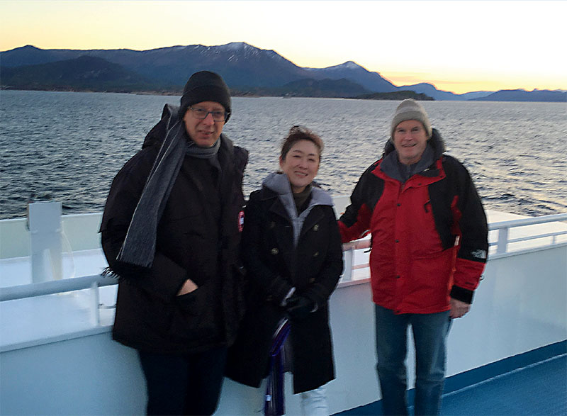 Yonathan Zohar, Keiko Saito, and Kevin Sowers on a boat in Norway. Photo courtesy of IMET